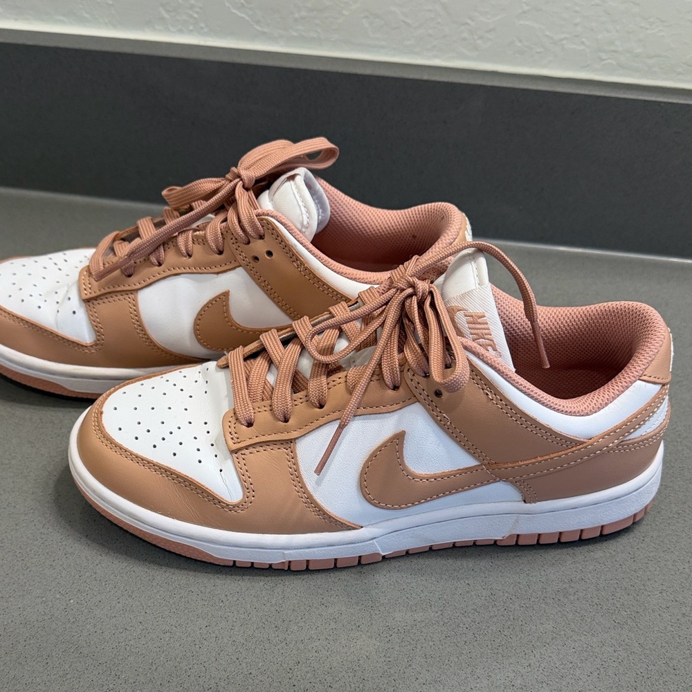 Women’s Nike White and Pink Low-Top Sneakers